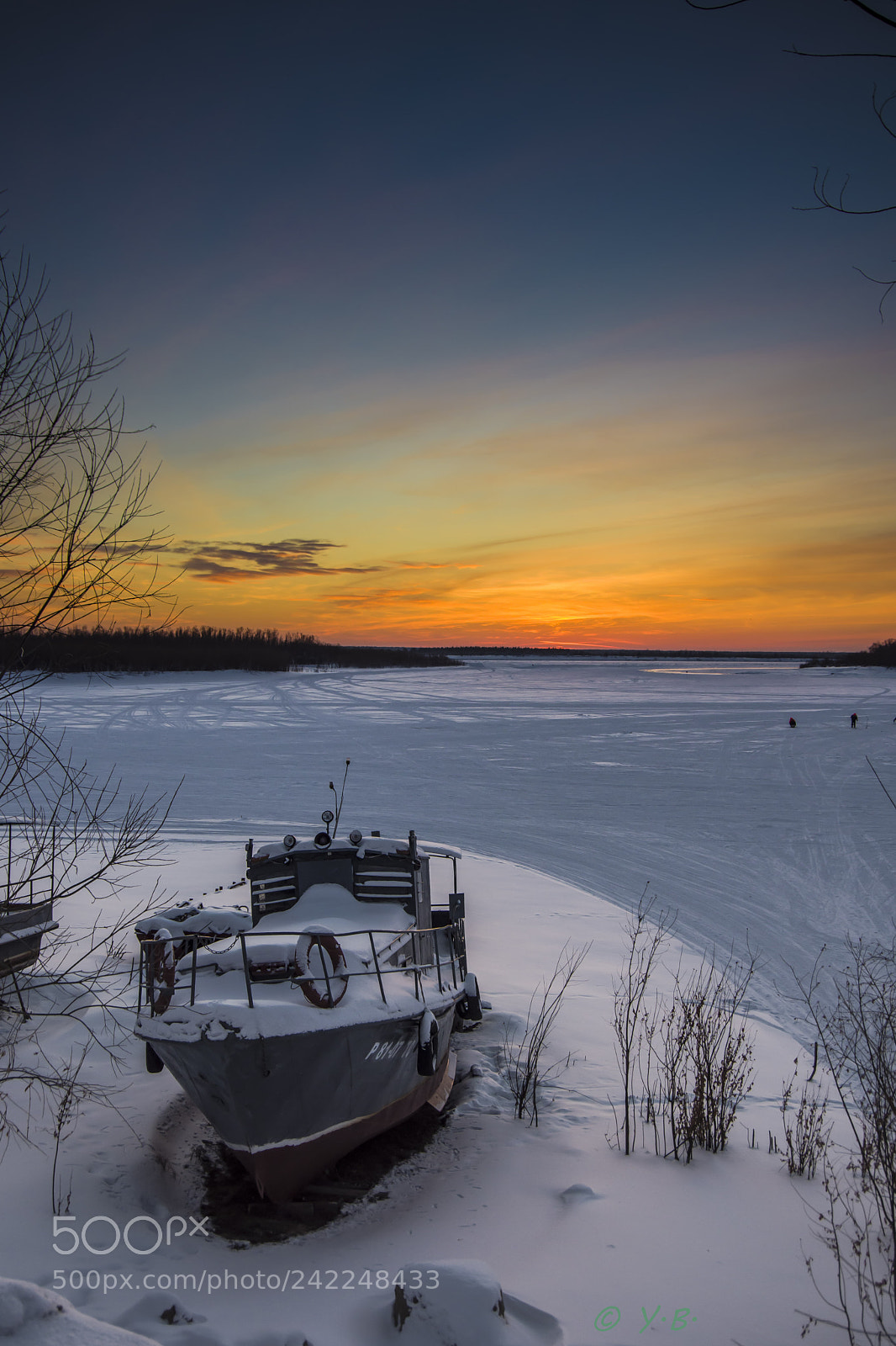 Pentax K-70 sample photo. Boat in ice river photography