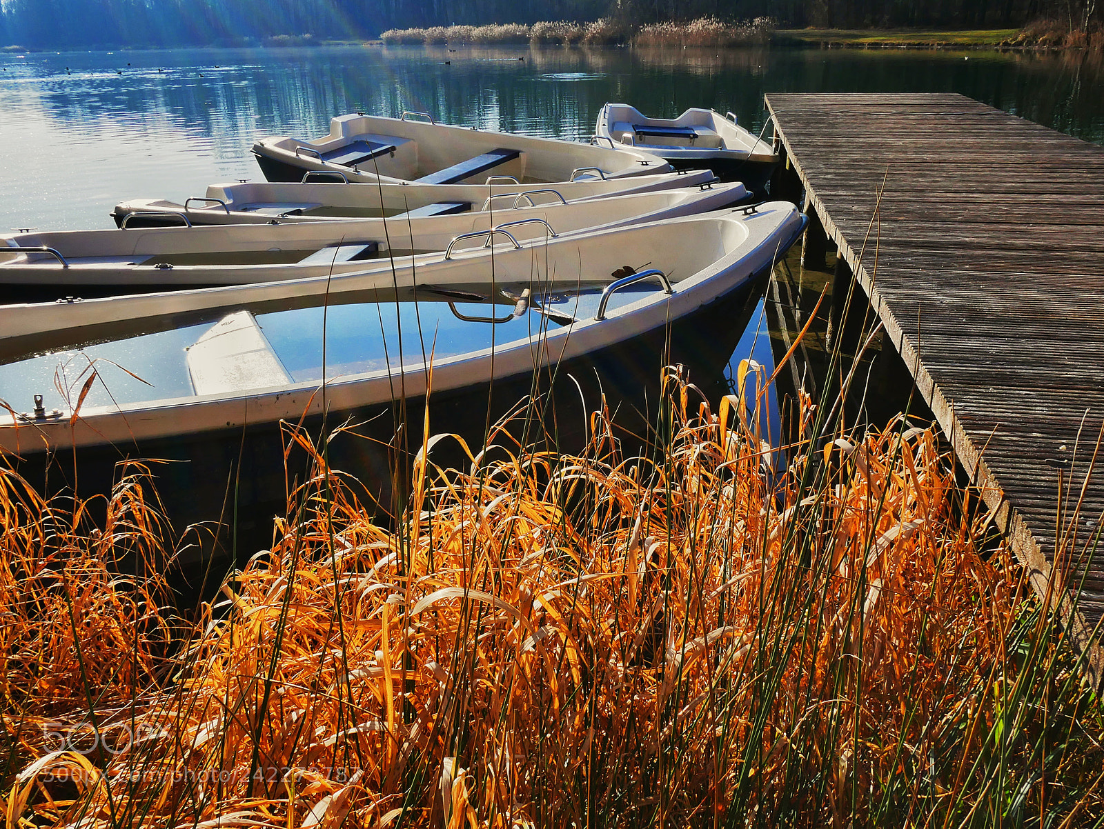 Panasonic Lumix DMC-GX85 (Lumix DMC-GX80 / Lumix DMC-GX7 Mark II) sample photo. Boats by the jetty photography