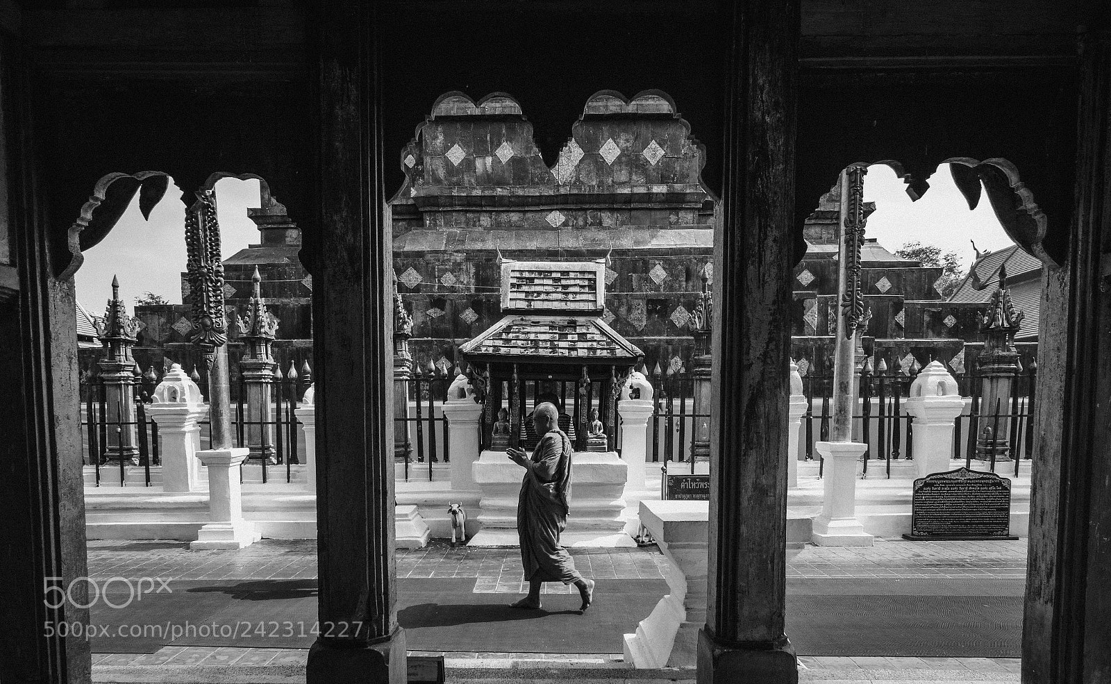 Nikon D7100 sample photo. Monk walking around pagoda photography