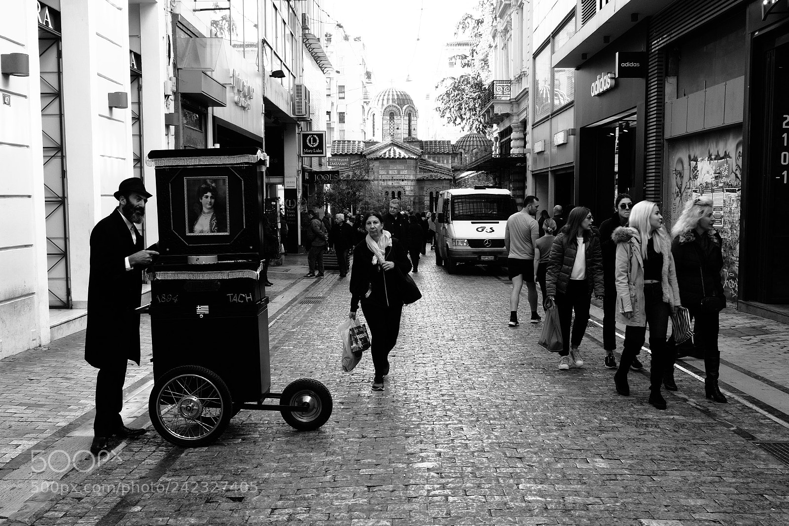 Olympus PEN-F sample photo. The barrel organ player photography