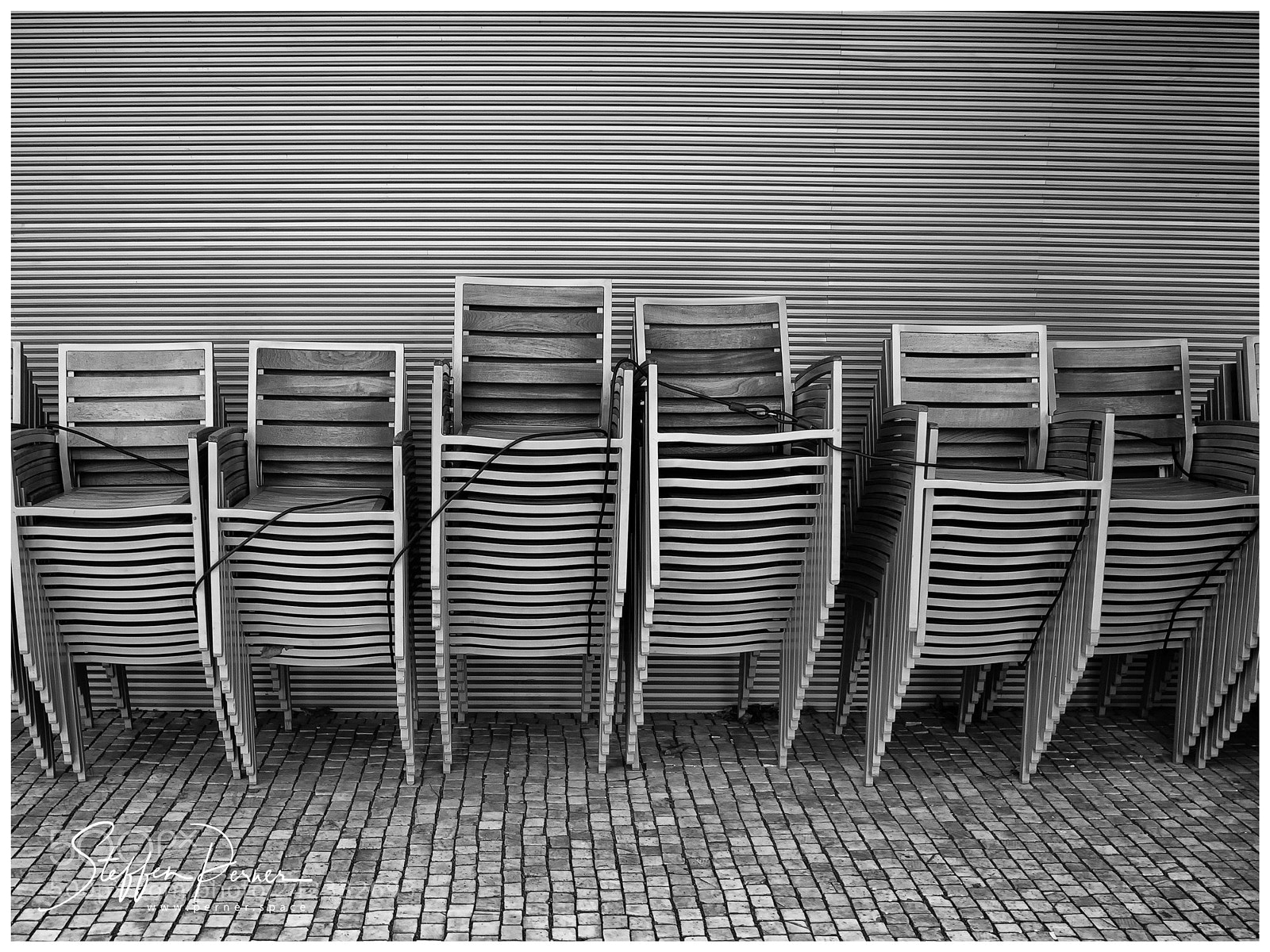 Olympus PEN E-PL7 sample photo. Stacked chairs photography