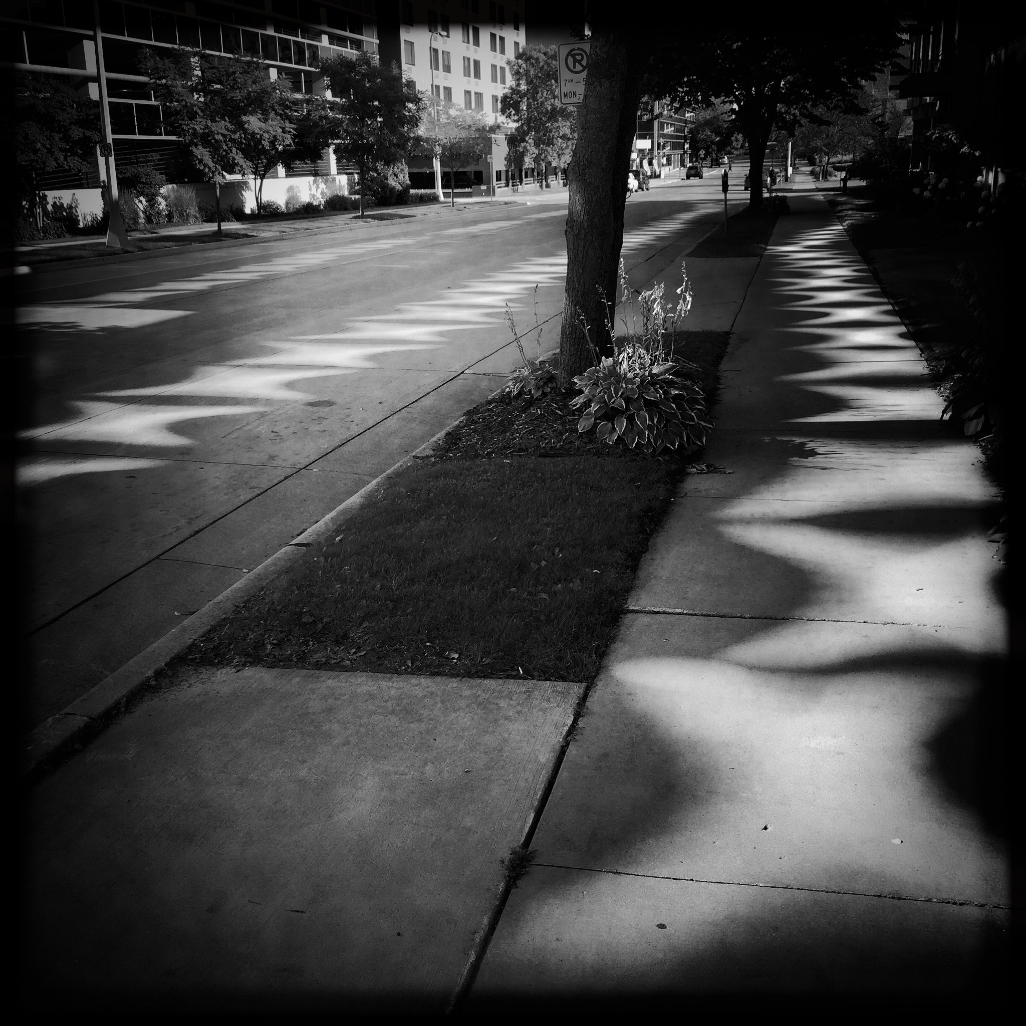 Hipstamatic 337 sample photo. Reflections off of a mirrored parking ramp at mayo clinic photography