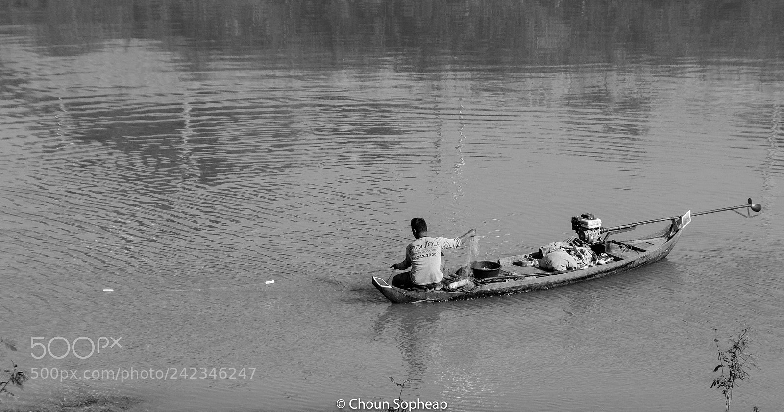 Canon EOS 60D sample photo. A boatman.jpg photography