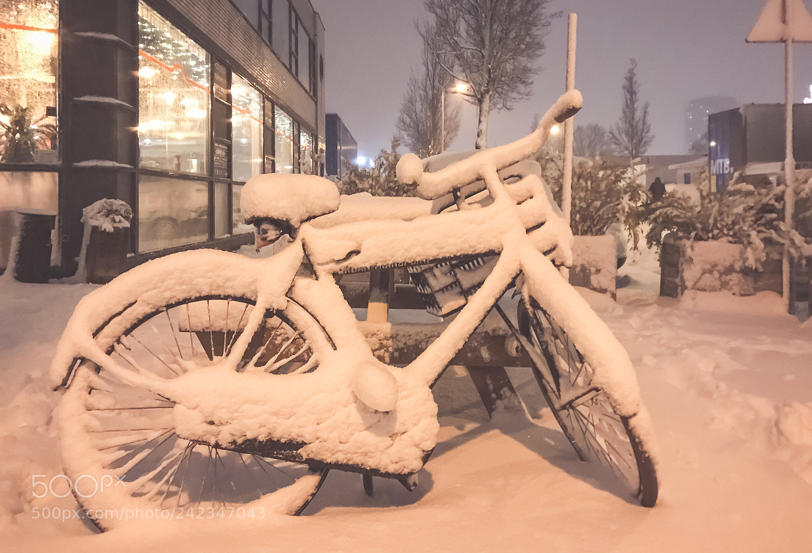Apple iPhone 7 sample photo. Snow on bikes in photography