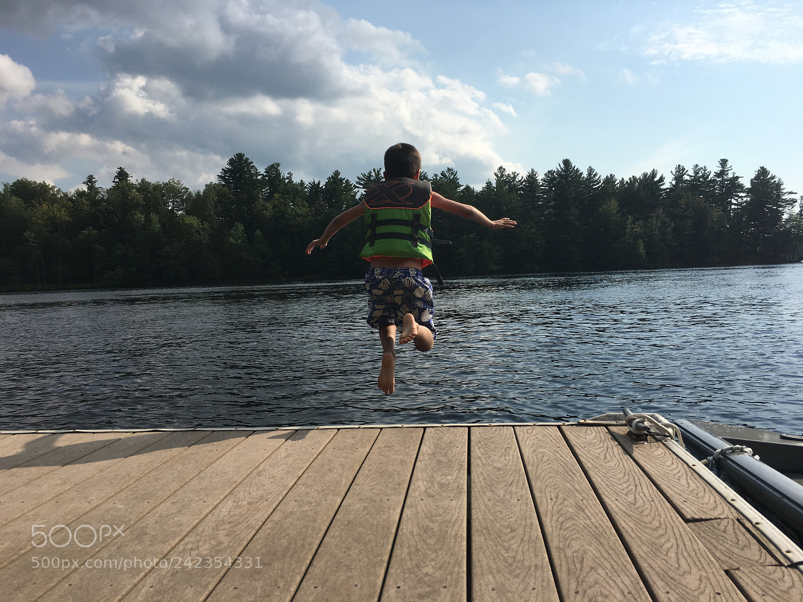 Apple iPhone 6s sample photo. Dock jumping photography