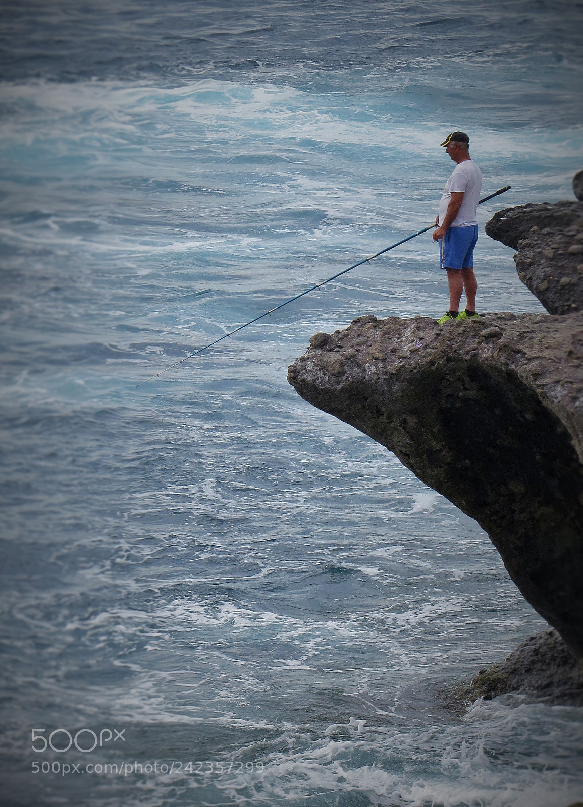 Canon PowerShot SX50 HS sample photo. Lone fisherman () photography