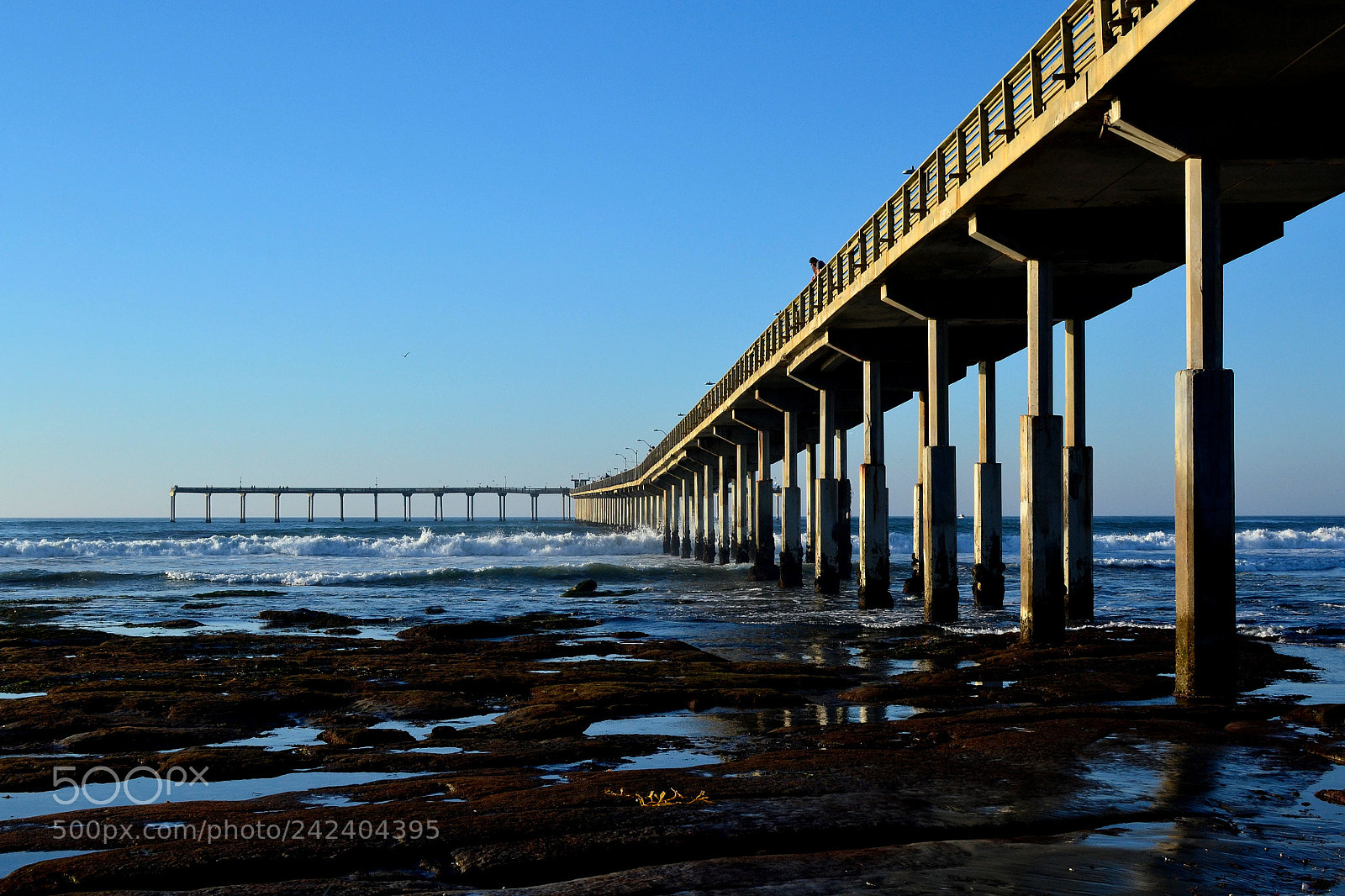 Nikon D3100 + Nikon AF-S DX Nikkor 35mm F1.8G sample photo. Ocean beach fishing pier photography