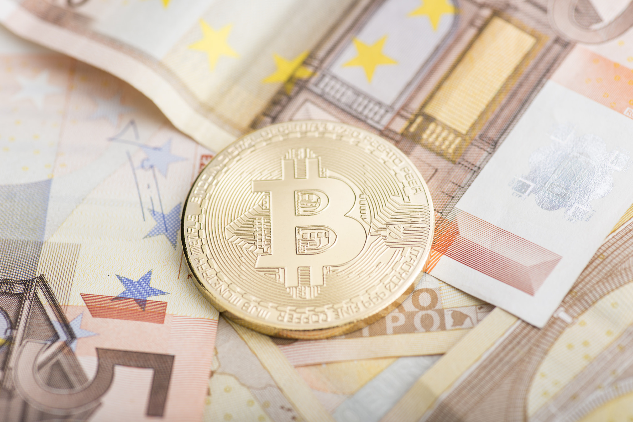 Bitcoin macro shoot on money background