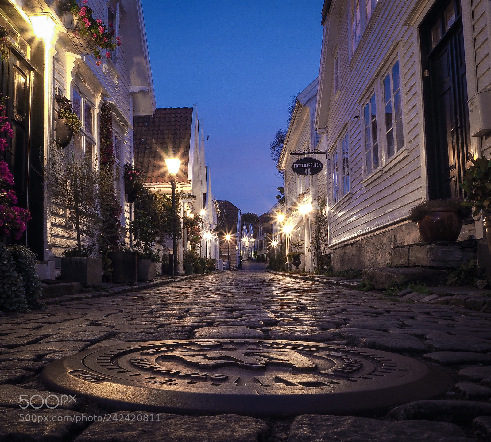 Olympus OM-D E-M10 sample photo. Cobblestone street in stavanger photography