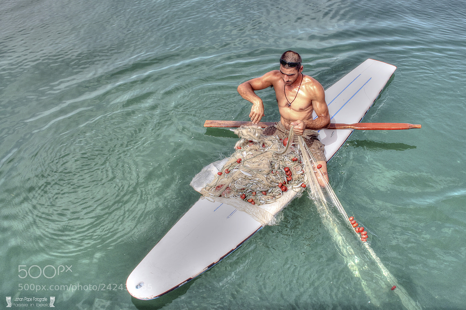 Canon EOS 1000D (EOS Digital Rebel XS / EOS Kiss F) sample photo. Fisherman on a surf photography
