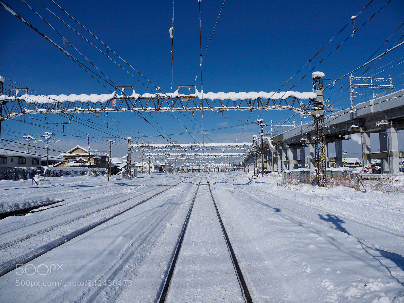 Olympus OM-D E-M10 II sample photo. Railroad snowcovered photography