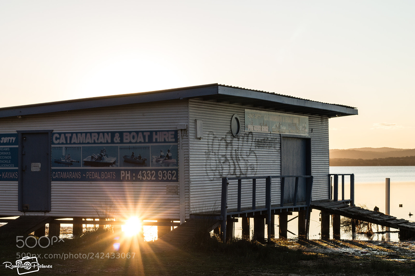 Canon EOS 1100D (EOS Rebel T3 / EOS Kiss X50) sample photo. Long jetty boat shed photography