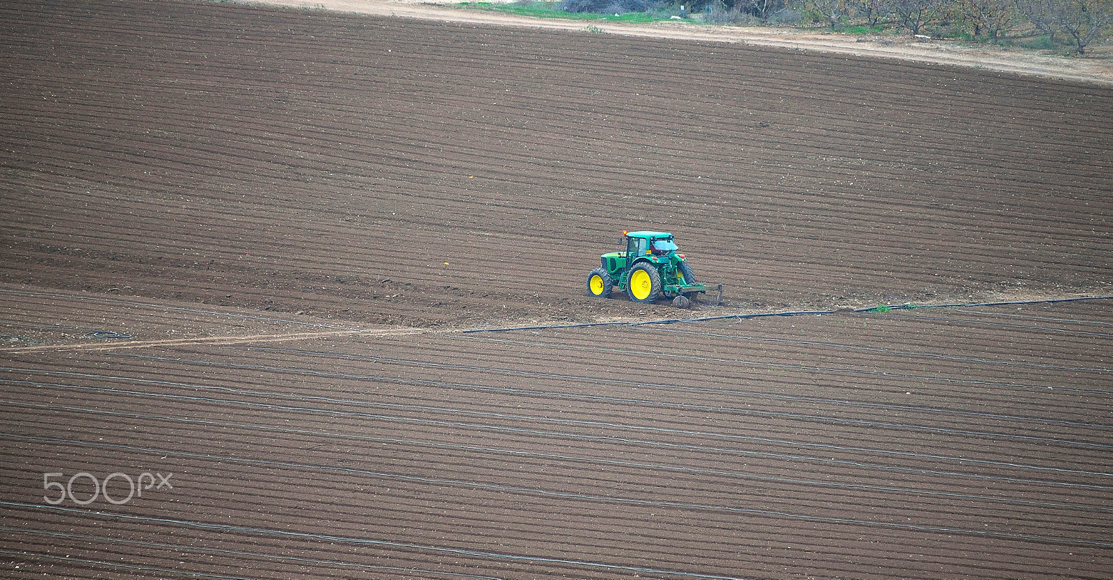 Nikon D3300 + Nikon AF-S DX Nikkor 18-300mm F3.5-6.3G ED VR sample photo. John deer tractor plowing the valley's fields photography