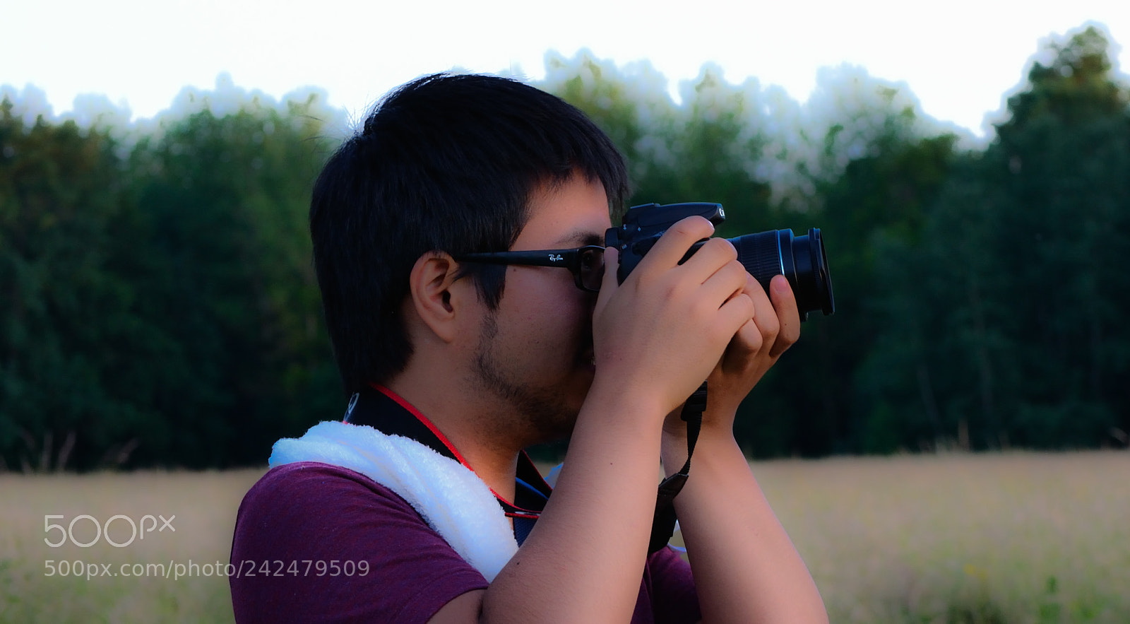 Nikon D3100 sample photo. Concentration behind the lenses photography