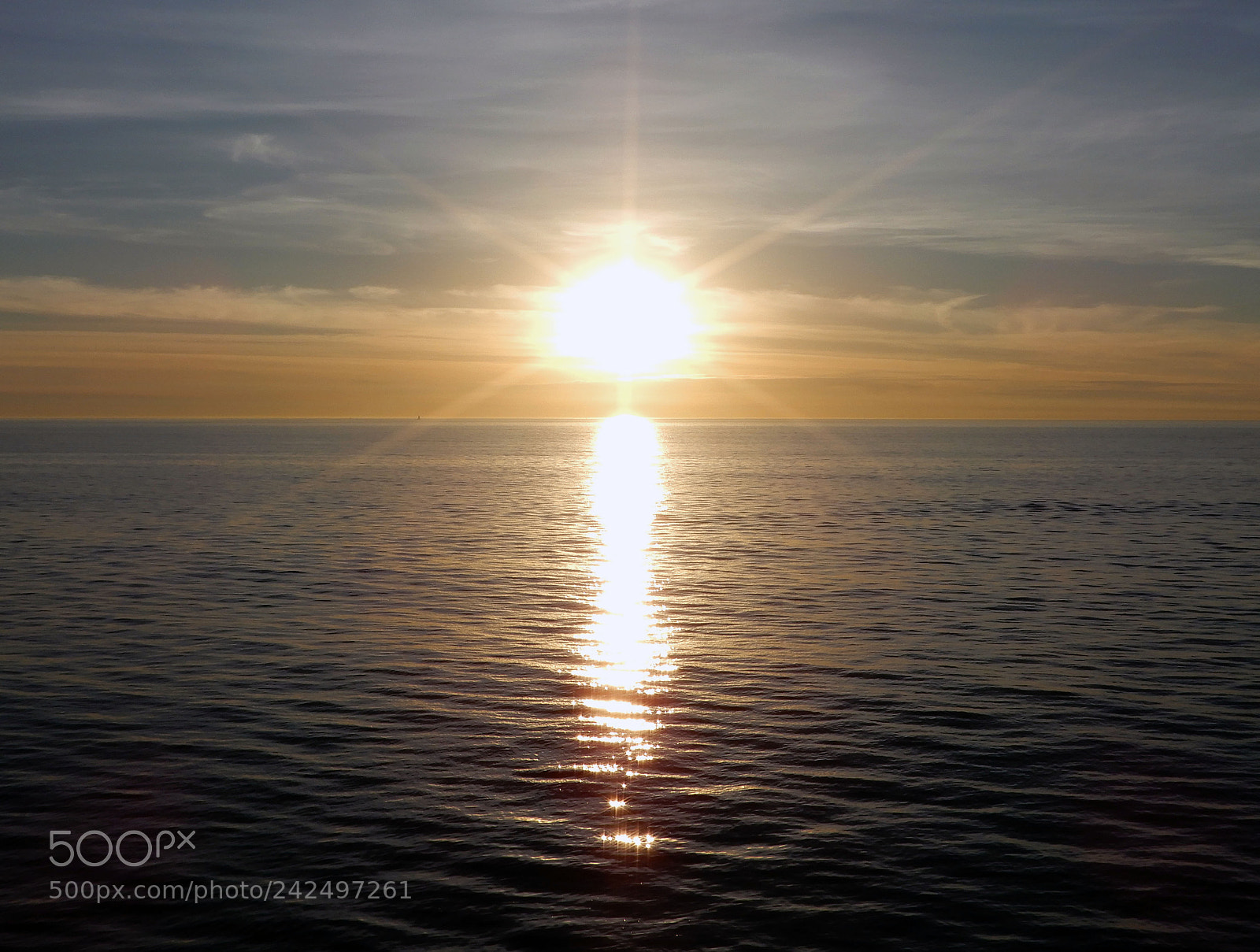Nikon Coolpix A900 sample photo. Sun flare over ocean photography