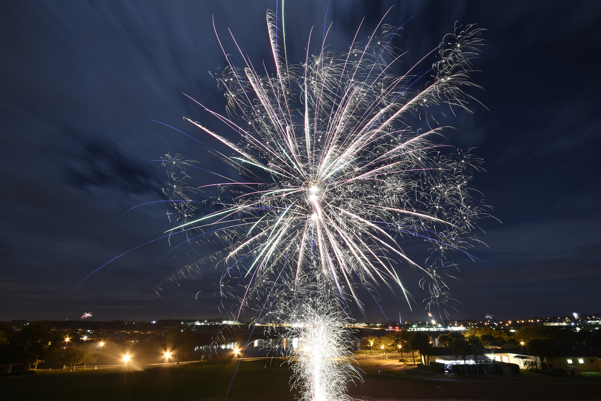 Nikon D810 + Sigma 10-20mm F4-5.6 EX DC HSM sample photo. Fireworks over a clermont skyline photography