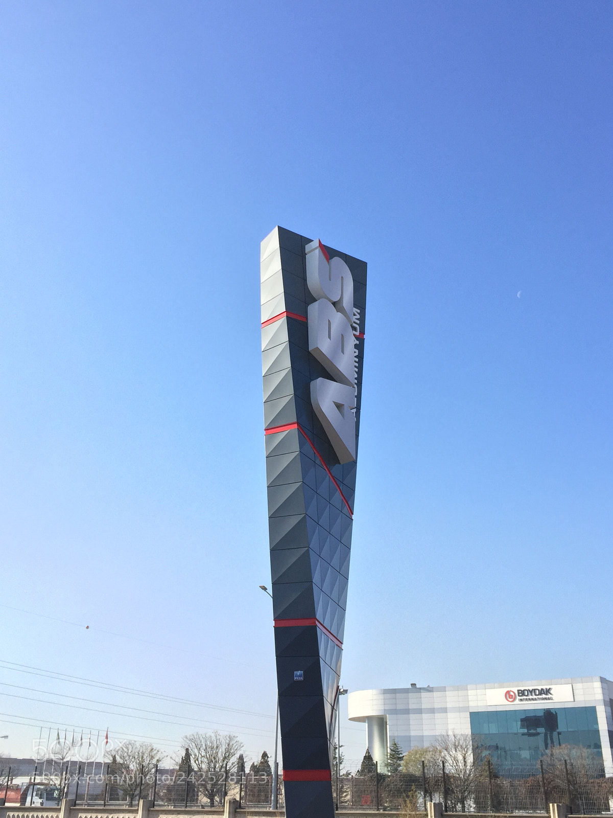 Apple iPhone 6 sample photo. Totem signs highrise photography