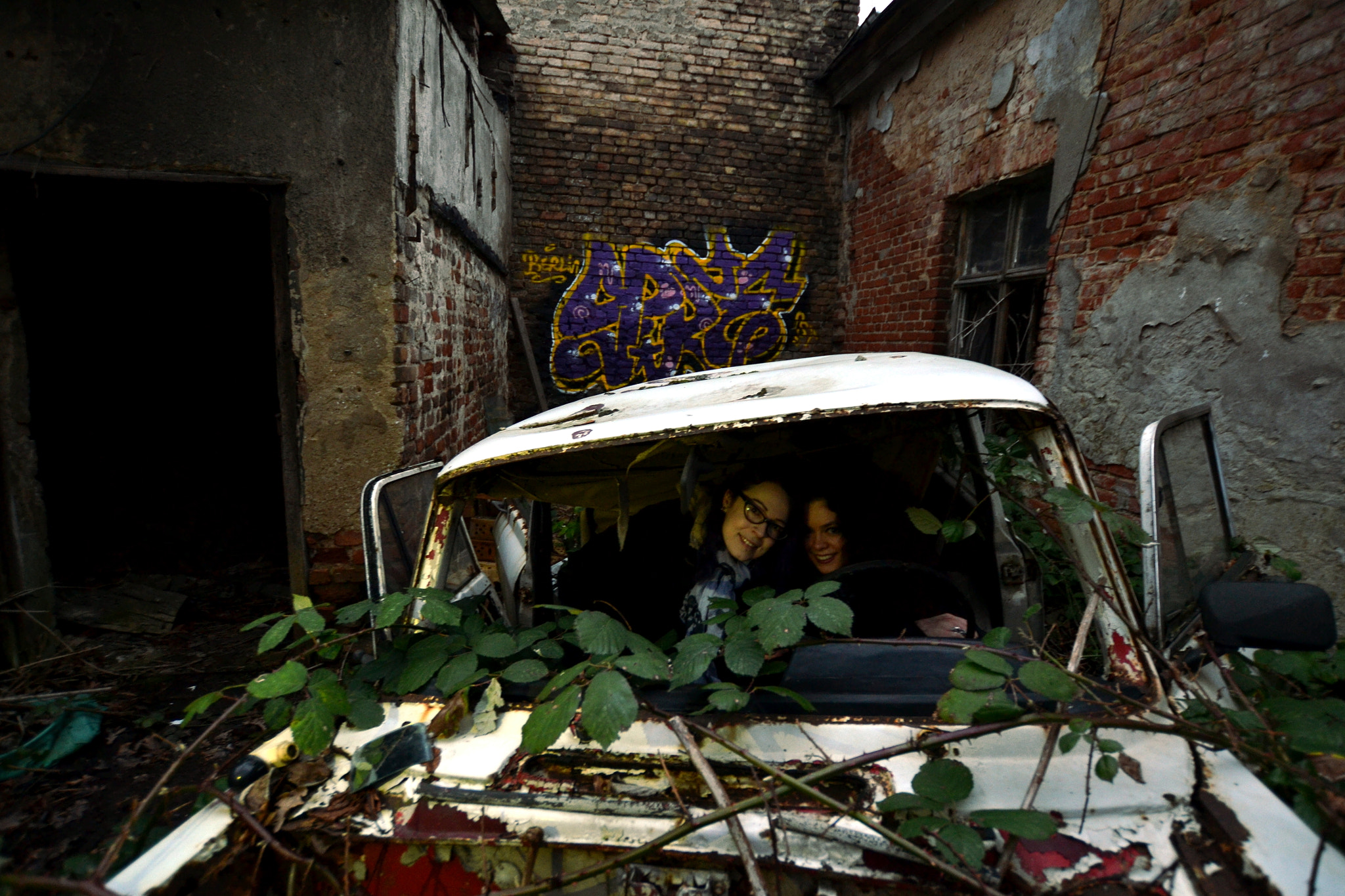 Nikon D3100 + Sigma 10-20mm F3.5 EX DC HSM sample photo. Abandoned car workshop photography