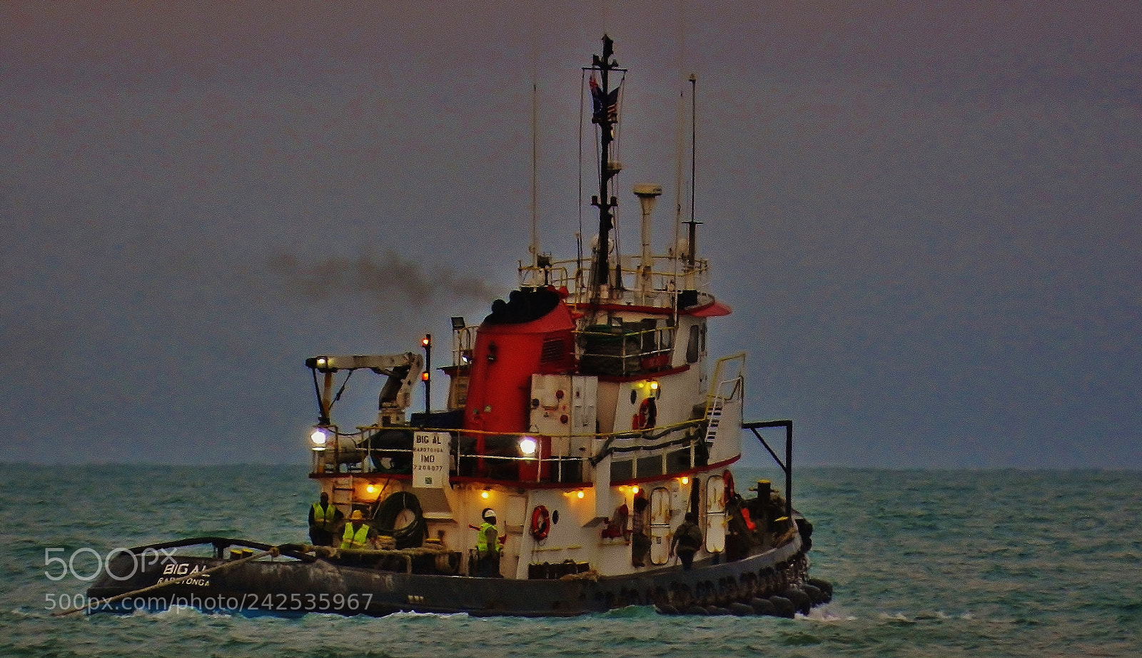 Nikon Coolpix P500 sample photo. Tugboat out to sea photography