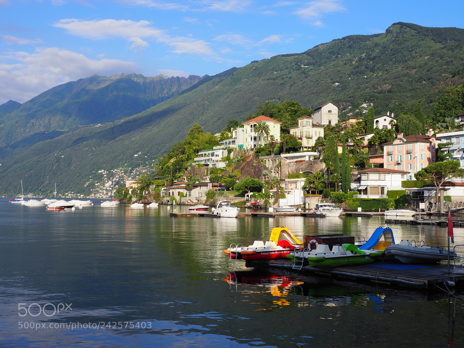 Olympus OM-D E-M1 Mark II sample photo. Colorful boats in haven photography