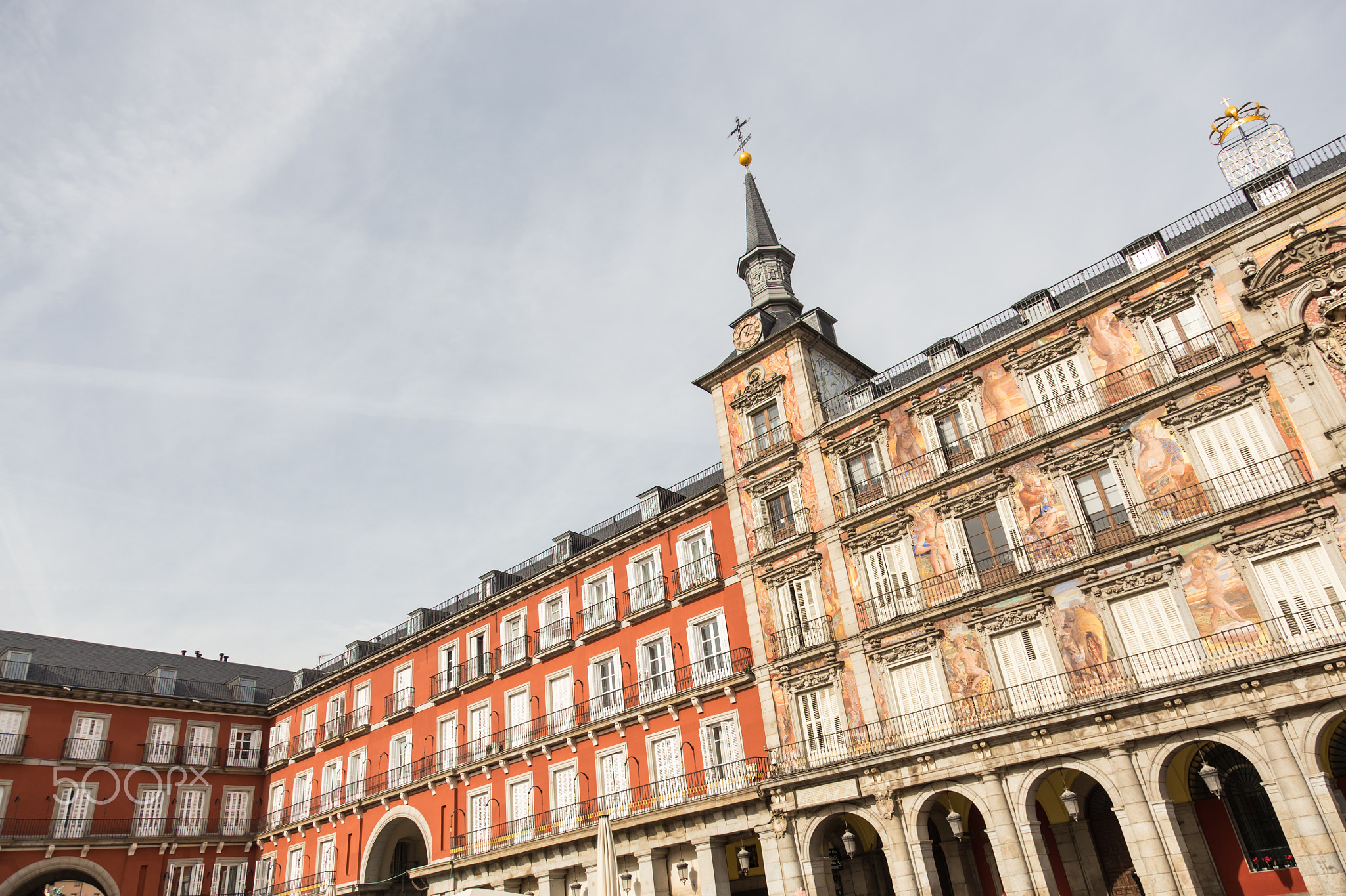 Detail of a decorated facade and balconies at the Palza Mayor, Madrid, Spain.