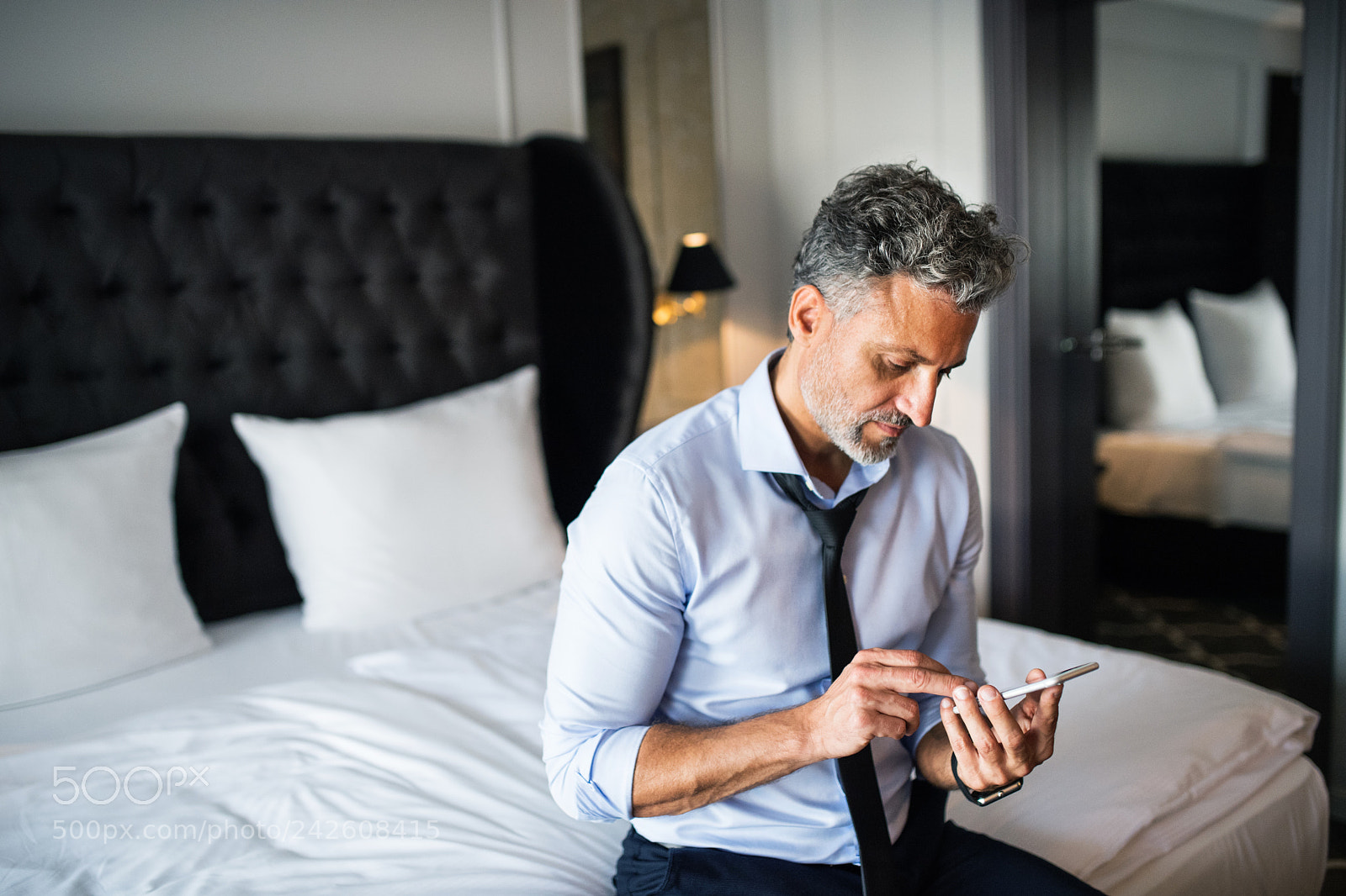 Nikon D5 sample photo. Mature businessman with smartphone photography