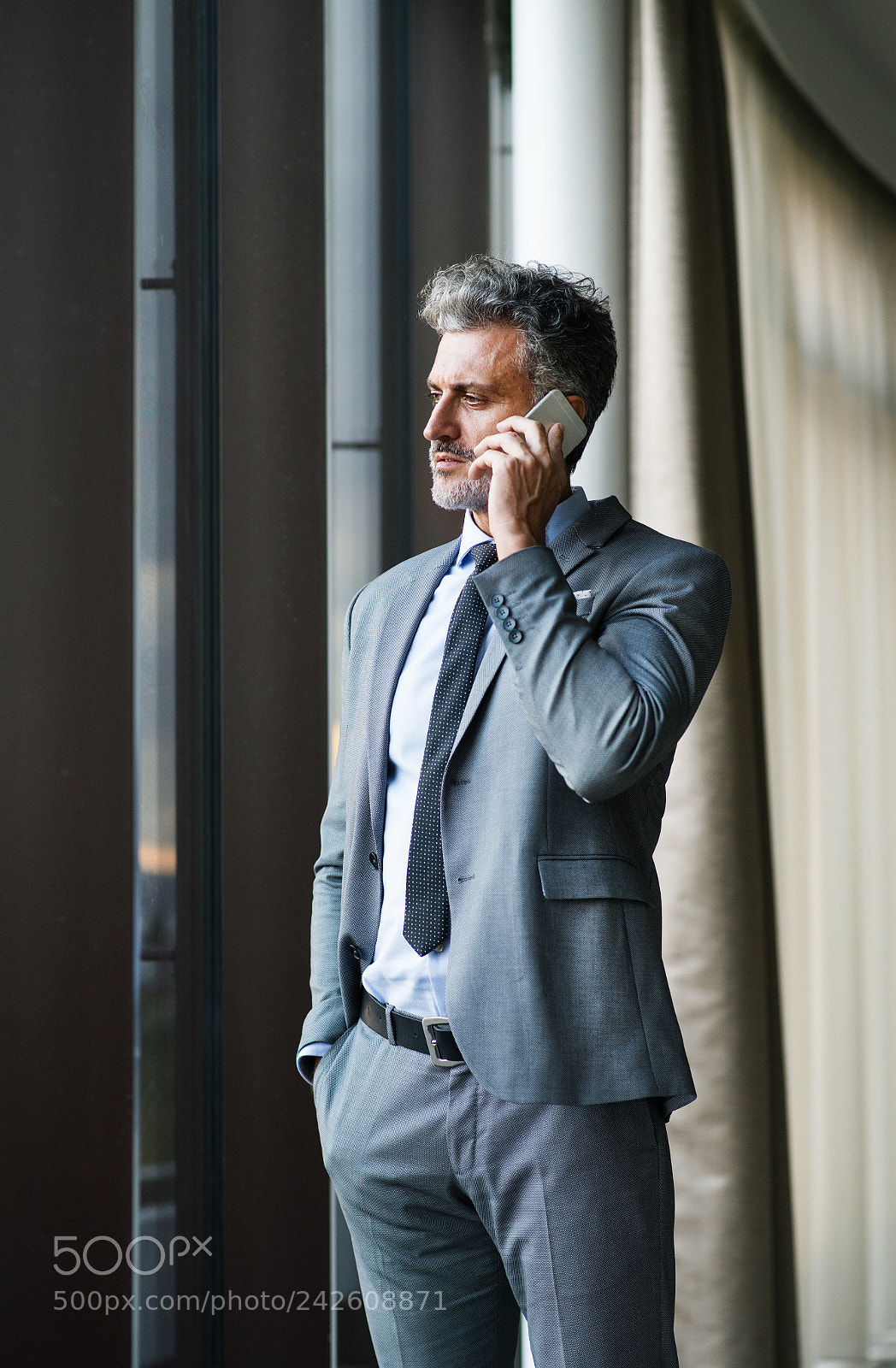 Nikon D5 sample photo. Mature businessman with smartphone photography