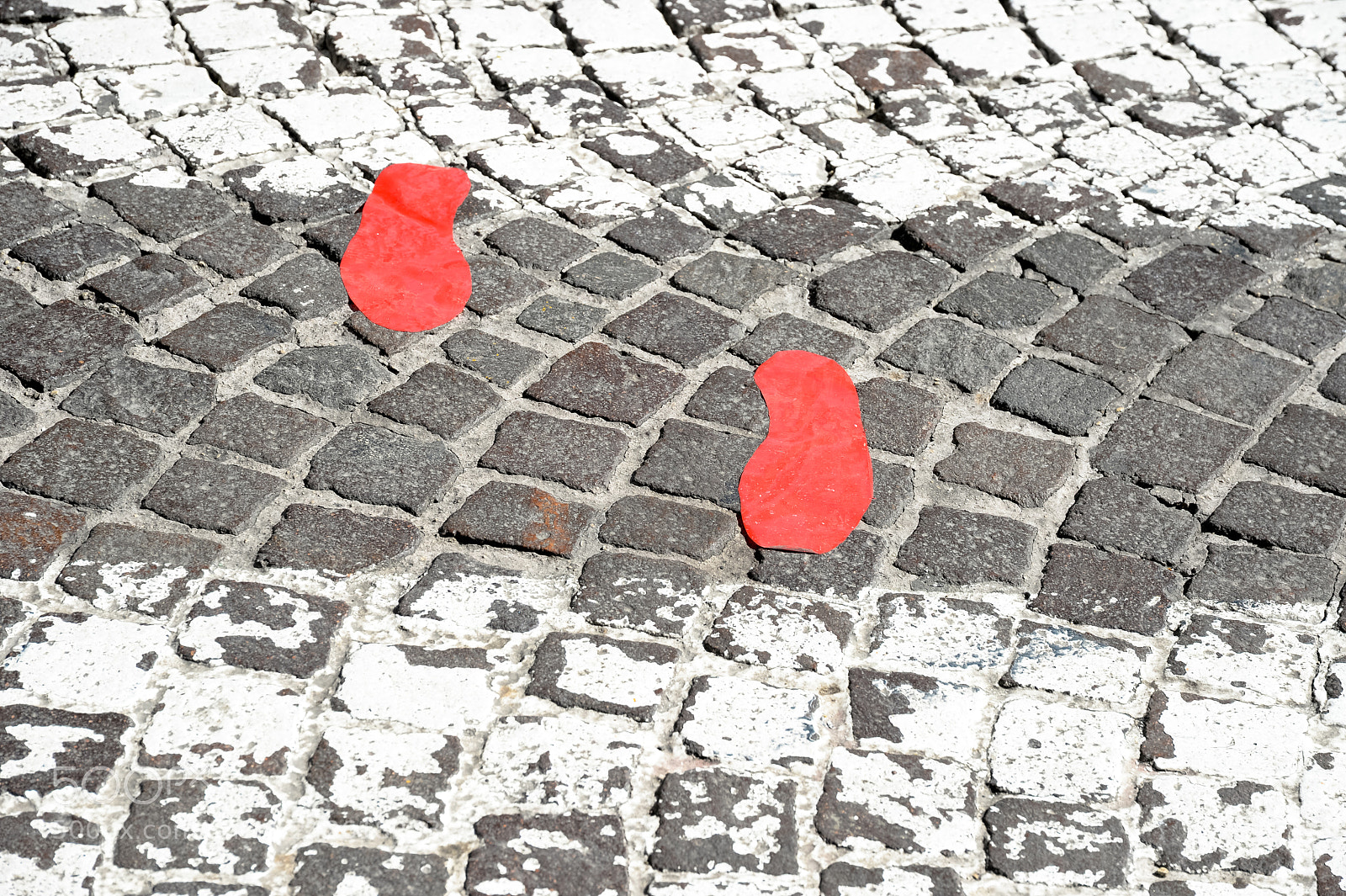 Nikon Df sample photo. Red footsteps in town photography
