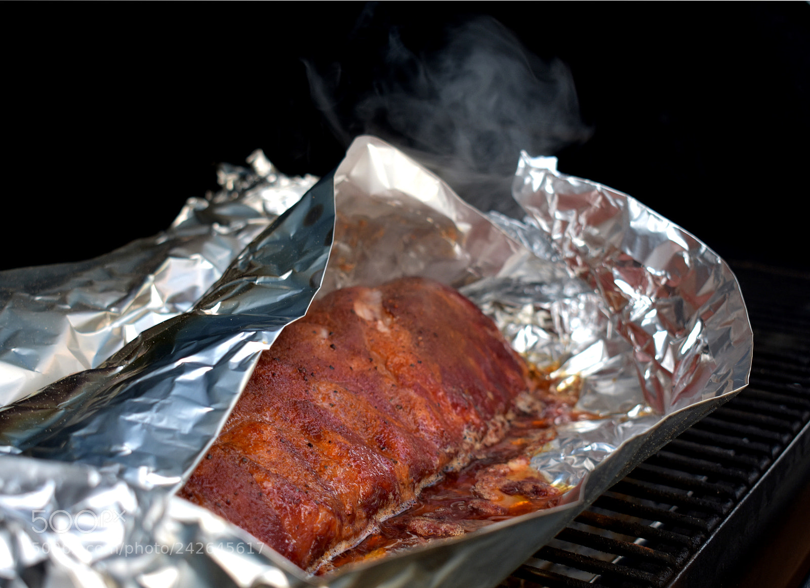 Nikon D3400 sample photo. Ribs in a smoker photography