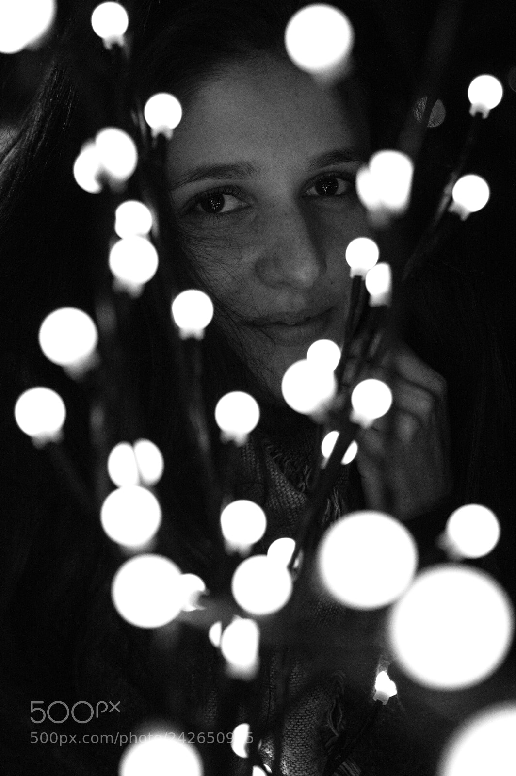 Nikon D3200 sample photo. Peeking between the lights photography