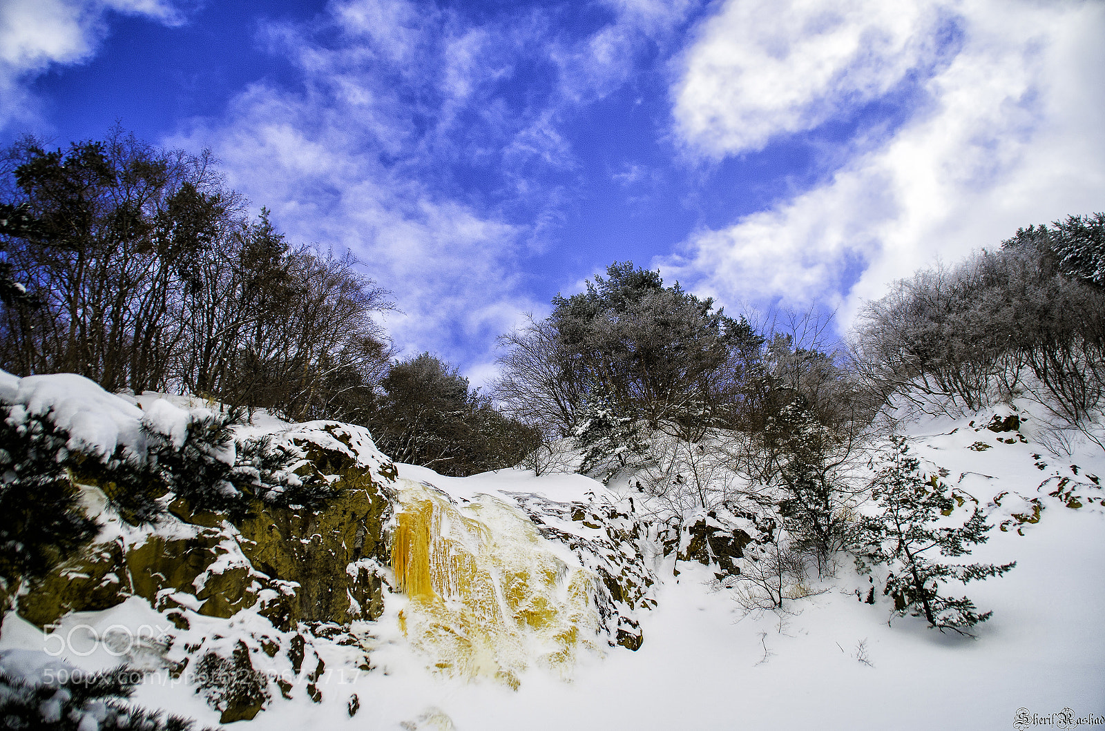 Pentax K-50 sample photo. Frozen acidic waterfall photography