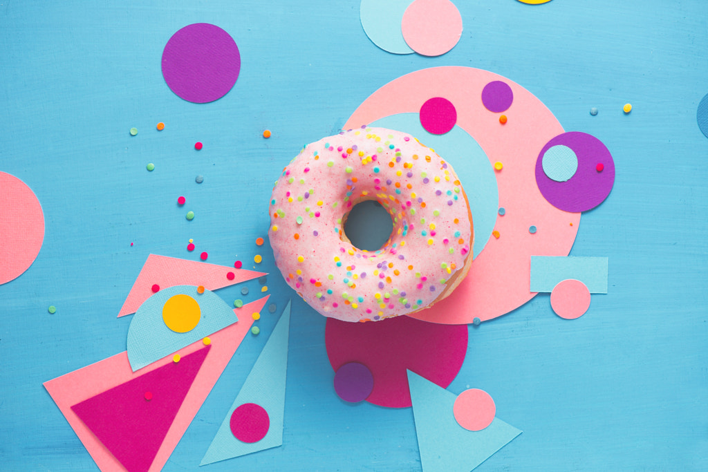 Color wheel - Pink glazed donut on a colorful background with geometric shapes. Color block food photography. by Dina (Food Photography) on 500px.com