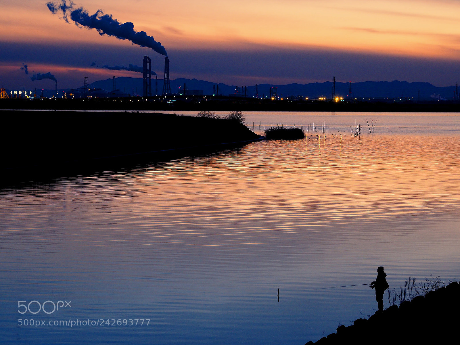 Olympus OM-D E-M10 II sample photo. Chimney and angler in photography
