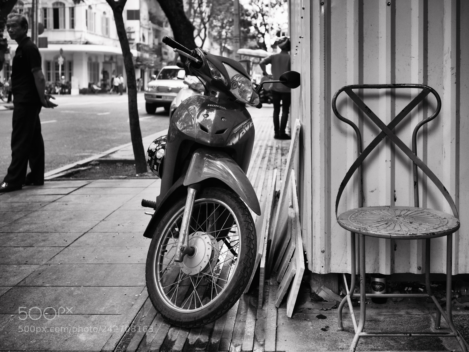 Panasonic Lumix DMC-GX7 sample photo. A scooter, a chair photography