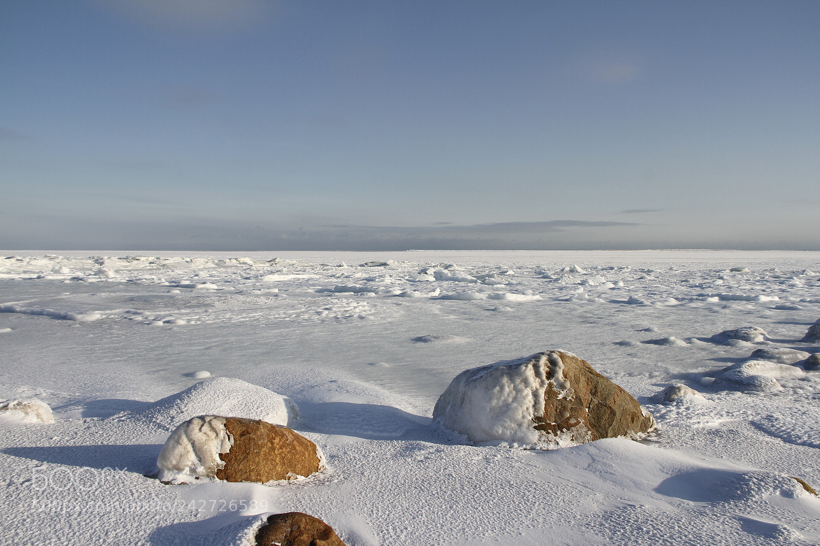 Canon EF-S 18-135mm F3.5-5.6 IS sample photo. Big rocks under snow photography