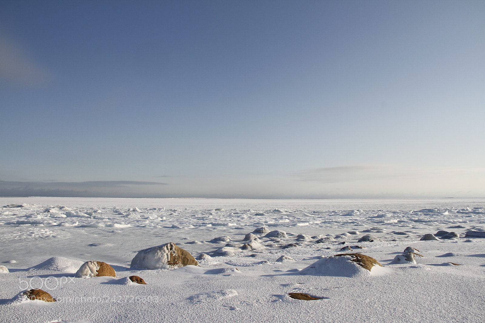 Canon EF-S 18-135mm F3.5-5.6 IS sample photo. Rocks in the snow photography