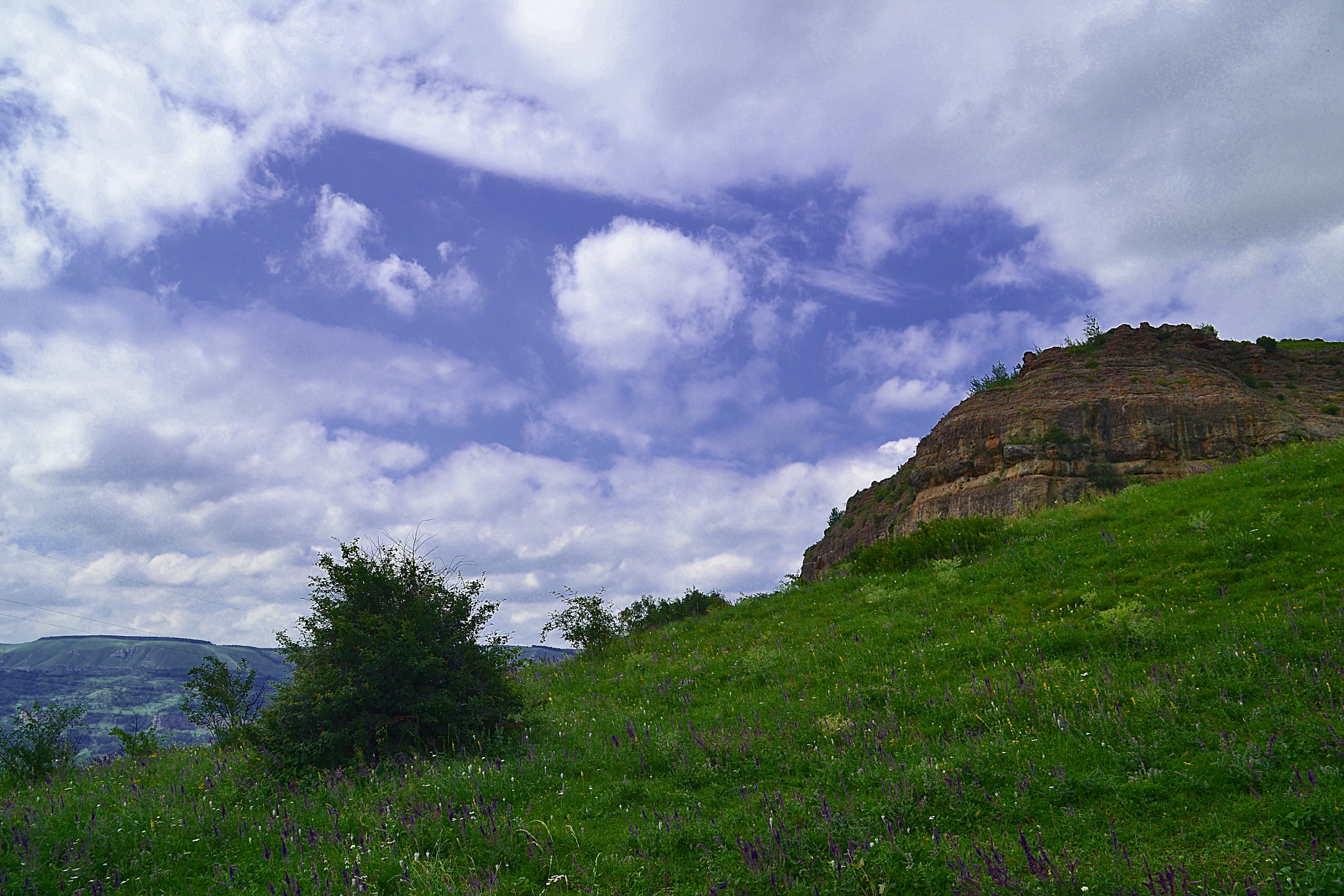 Nikon D3100 sample photo. Mountains in a slight magenta-style photography