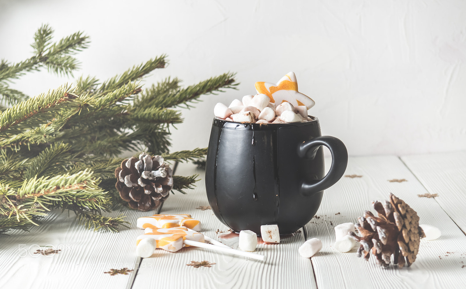 Olympus OM-D E-M10 II sample photo. Black mug with marshmallow photography