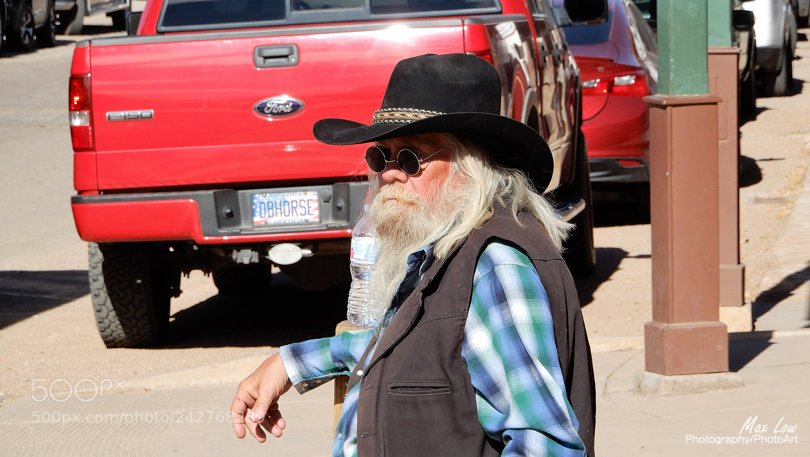 Nikon Coolpix A900 sample photo. Black hat cowboy photography