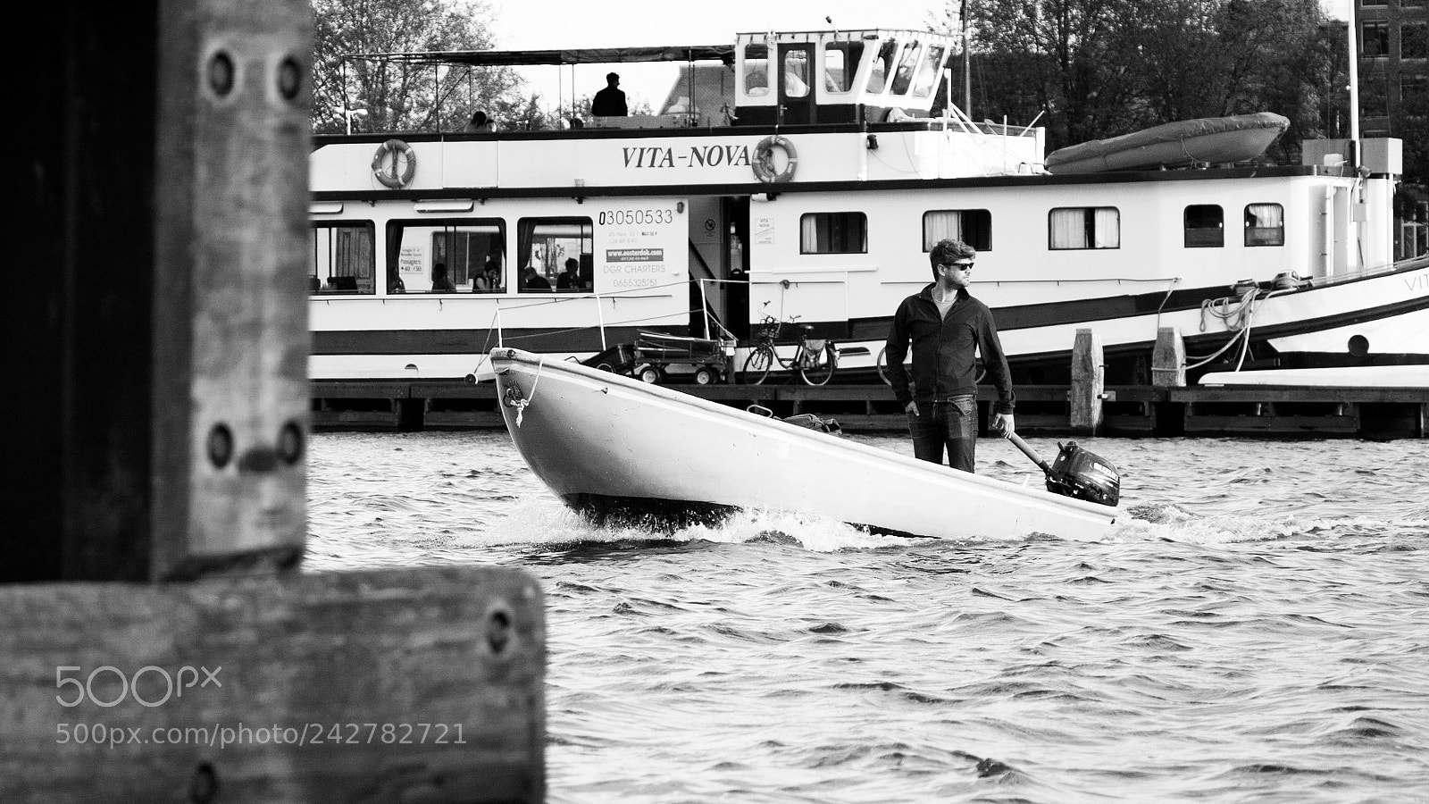 Canon EOS 7D Mark II sample photo. Man on boat in photography