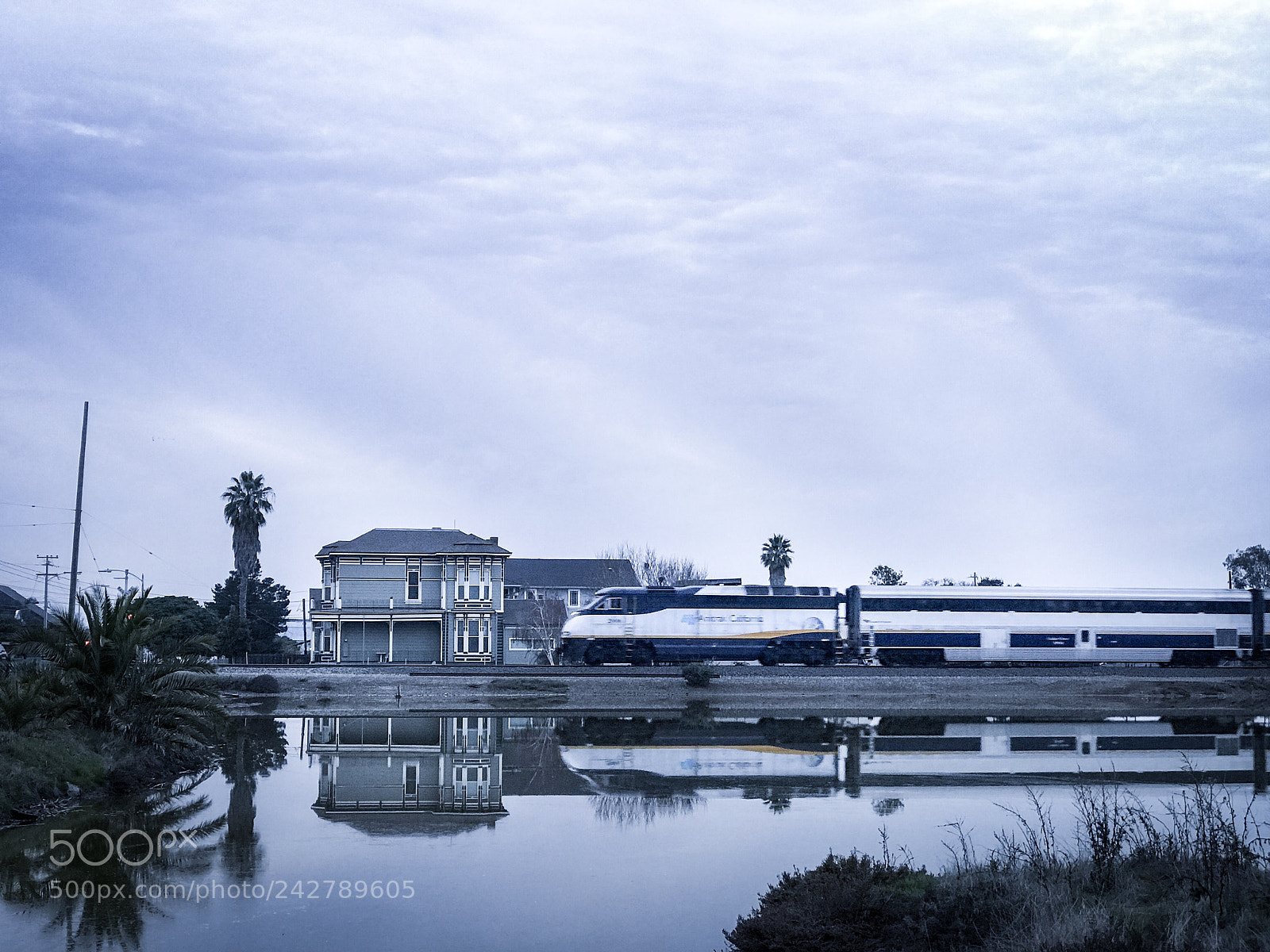 Apple iPhone 7 Plus sample photo. Chasing reflections and train photography