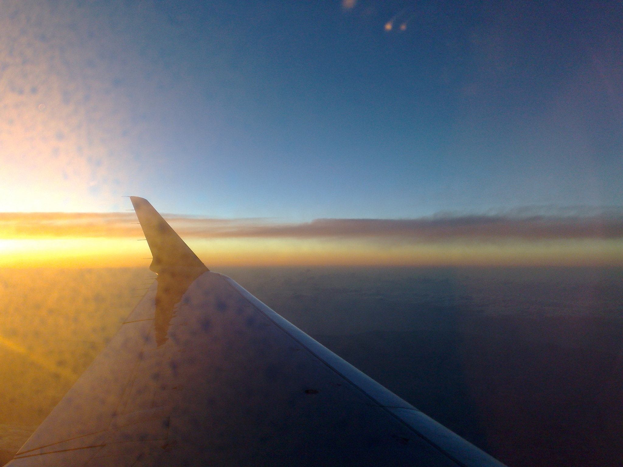 Nokia N95 8GB sample photo. Sunset behind airplane wing photography