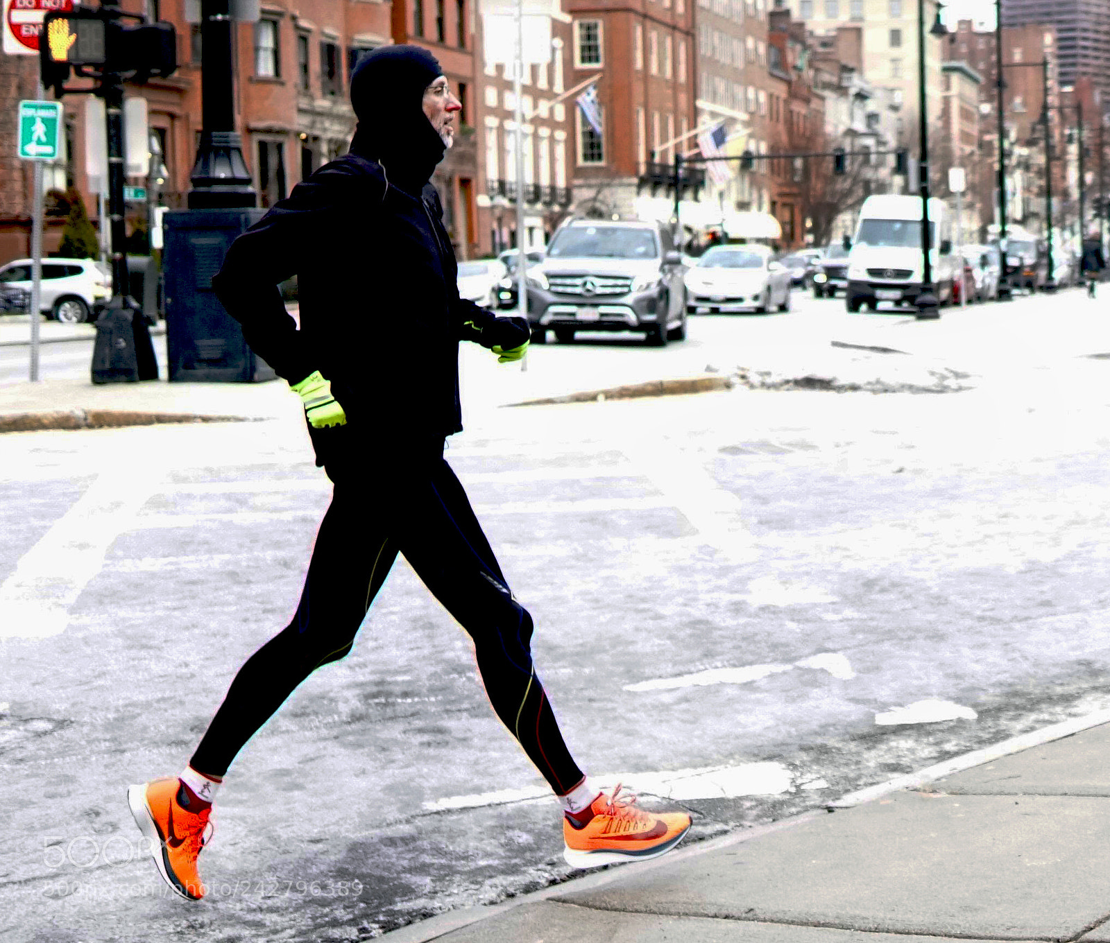 Sony a6500 sample photo. A runner hoping onto photography
