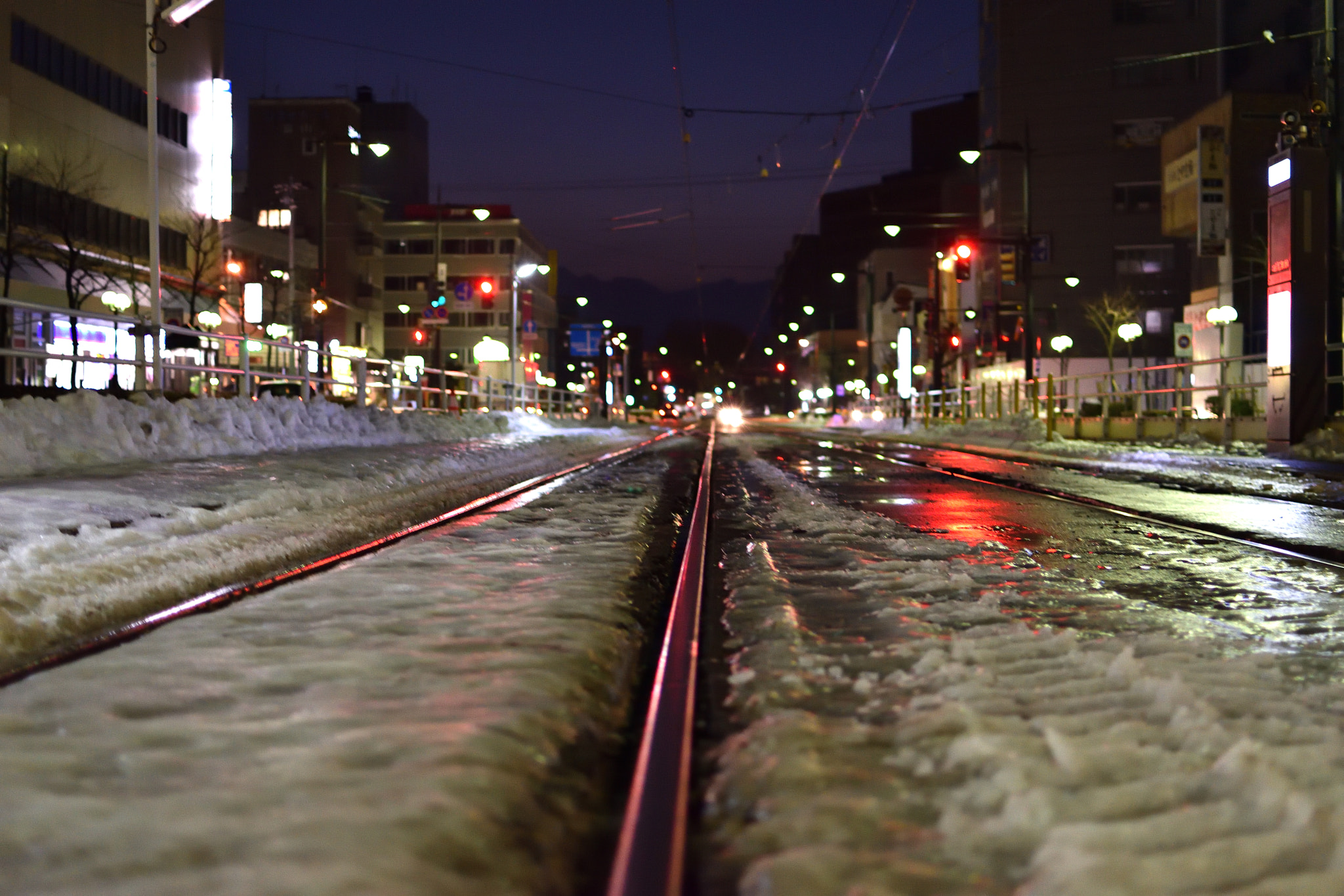 Nikon AF-S DX Nikkor 35mm F1.8G sample photo. Tram track in toyama,japan photography