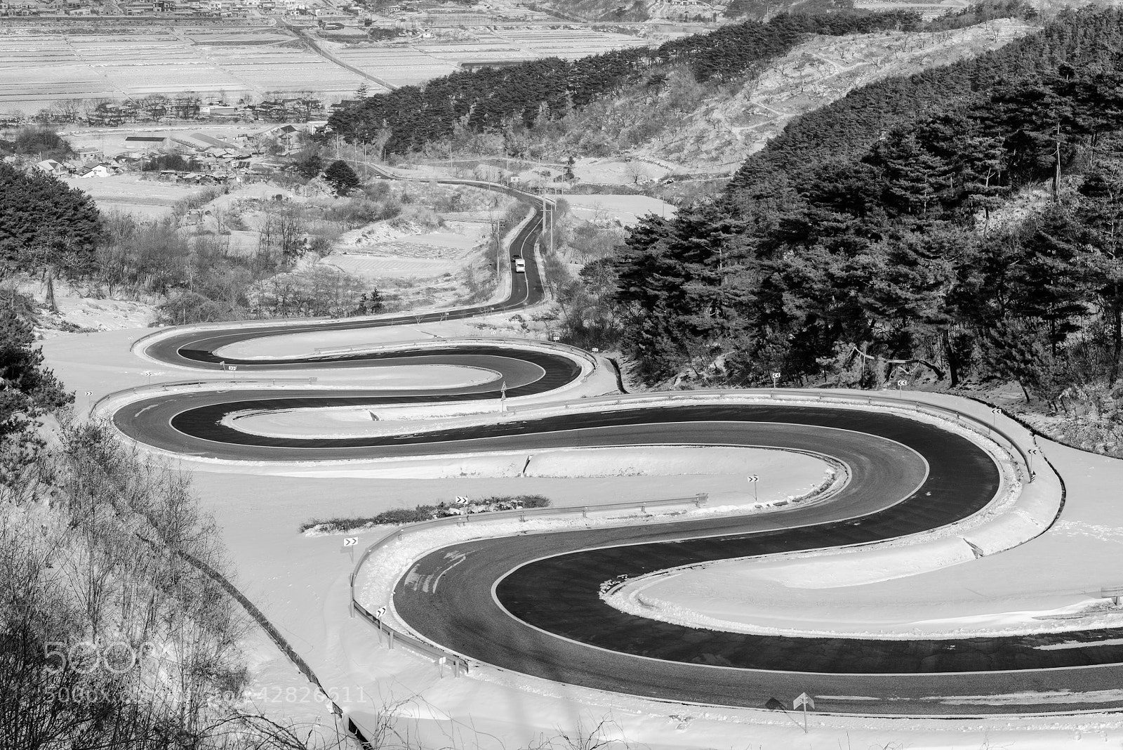 Nikon D810 sample photo. A winding snake road photography