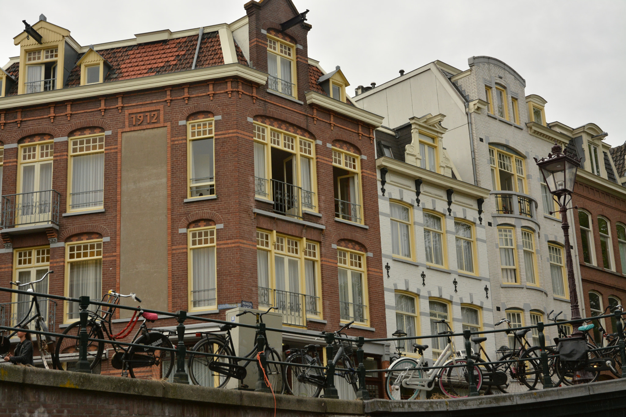 Nikon D7100 sample photo. Amsterdam bicycles and bridge photography