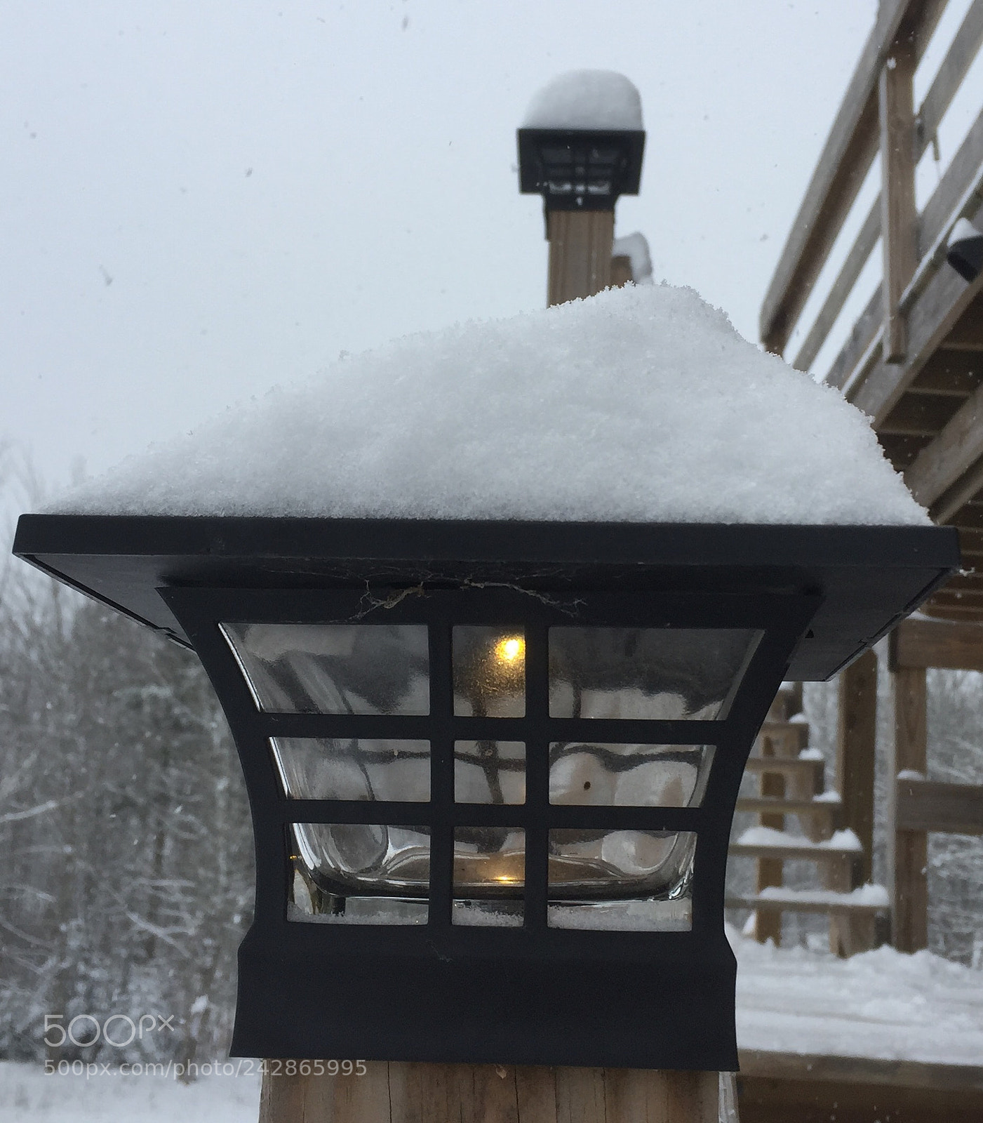 Apple iPhone 6 sample photo. Snow covered lighted lamp photography