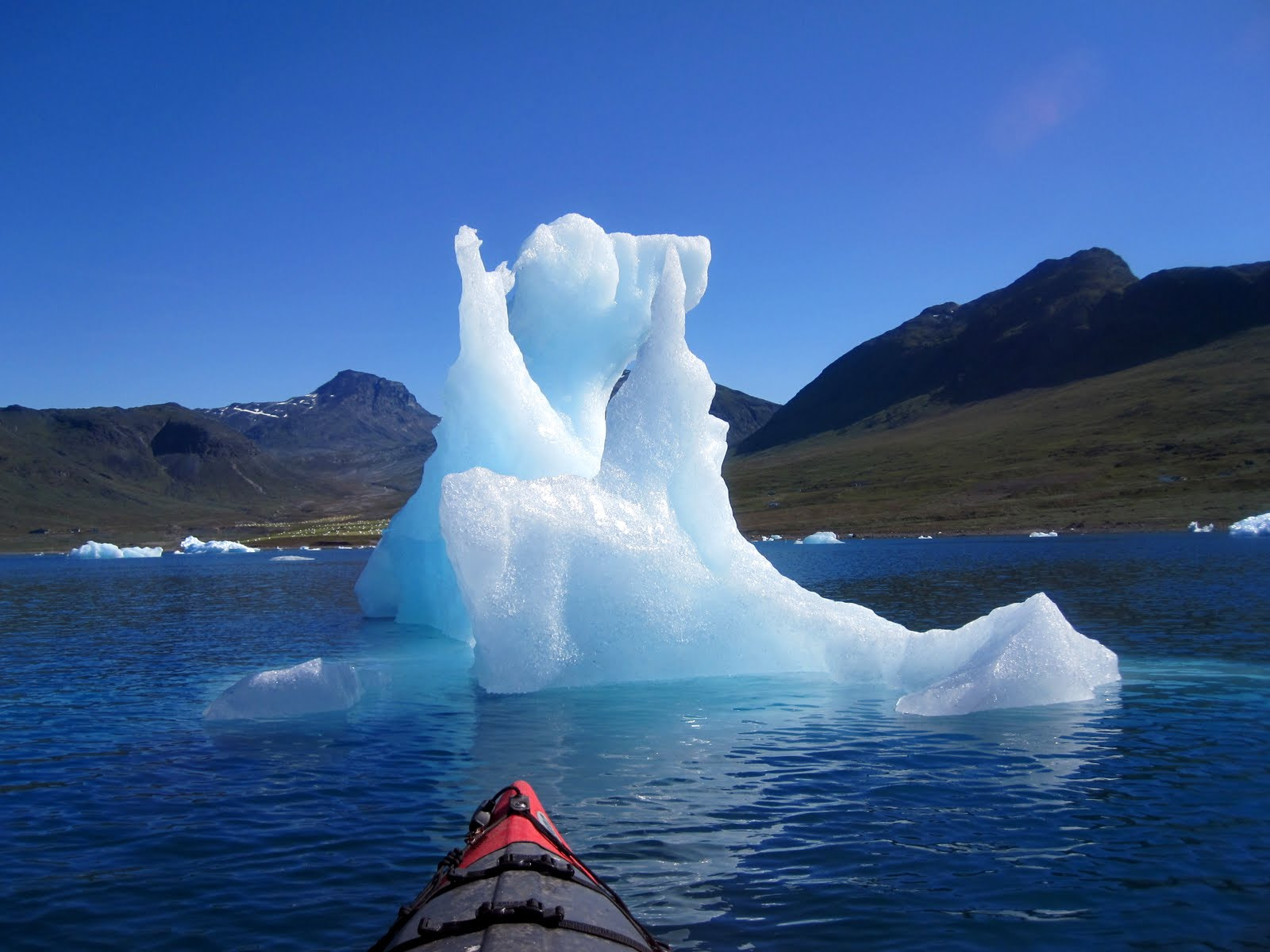 Canon PowerShot SD780 IS (Digital IXUS 100 IS / IXY Digital 210 IS) sample photo. Man in armchair  (iceberg  greenland) photography