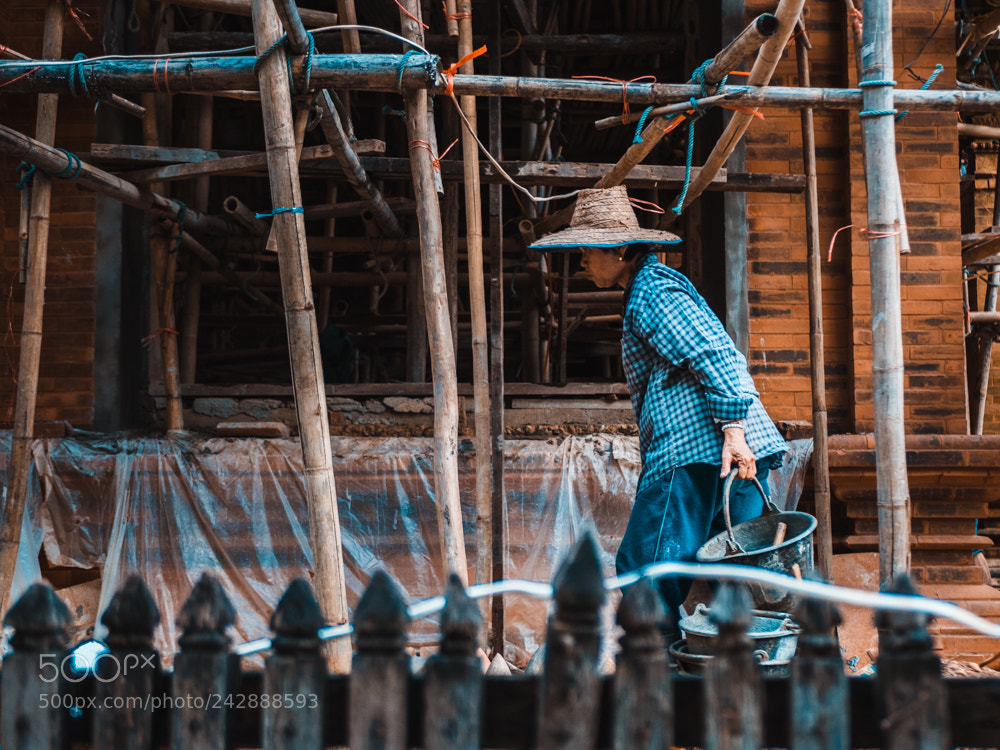 Olympus OM-D E-M5 II sample photo. Woman at the construction photography