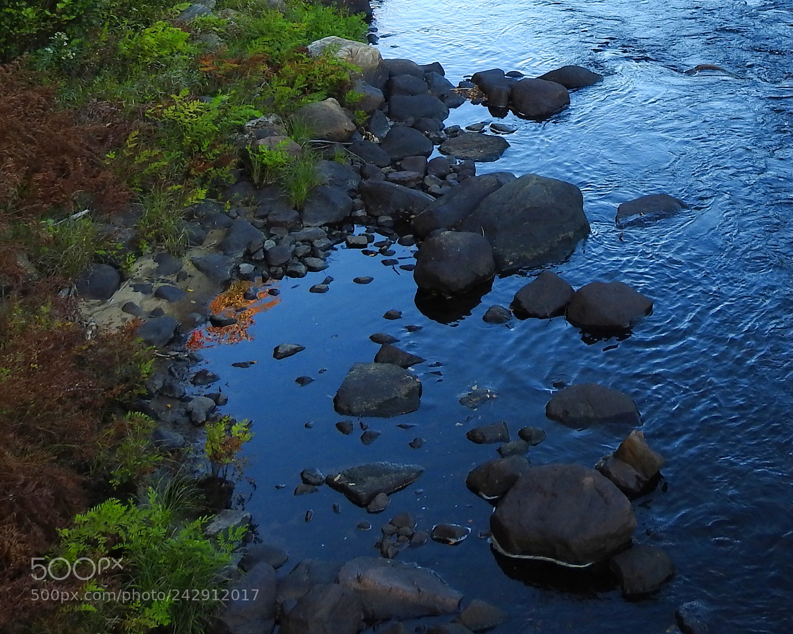 Nikon Coolpix P900 sample photo. River rocks and shore photography